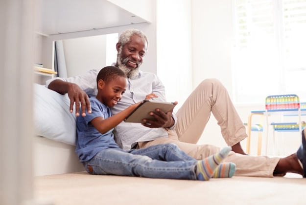 Family looking at a tablet