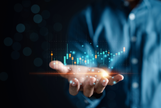 Person holding a graph in their hand