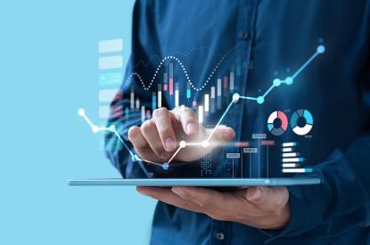 A person views wealth portfolio on their tablet