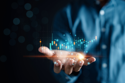Person holding a graph in their hand