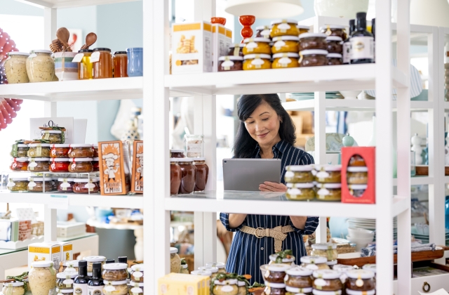 Women taking inventory stock of shelves